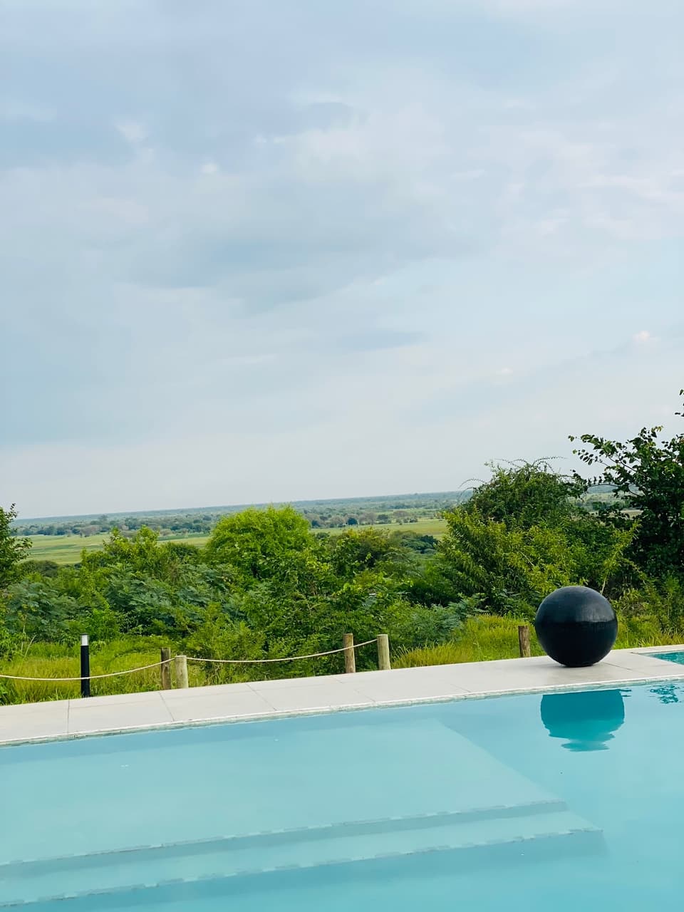 The lodge pool in the foreground with the floodplain reaching to the horizon
